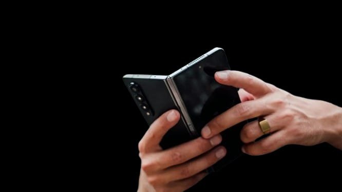 Motorola hints about first book-style foldable at CES 2026, coupled with the new Signature Era.